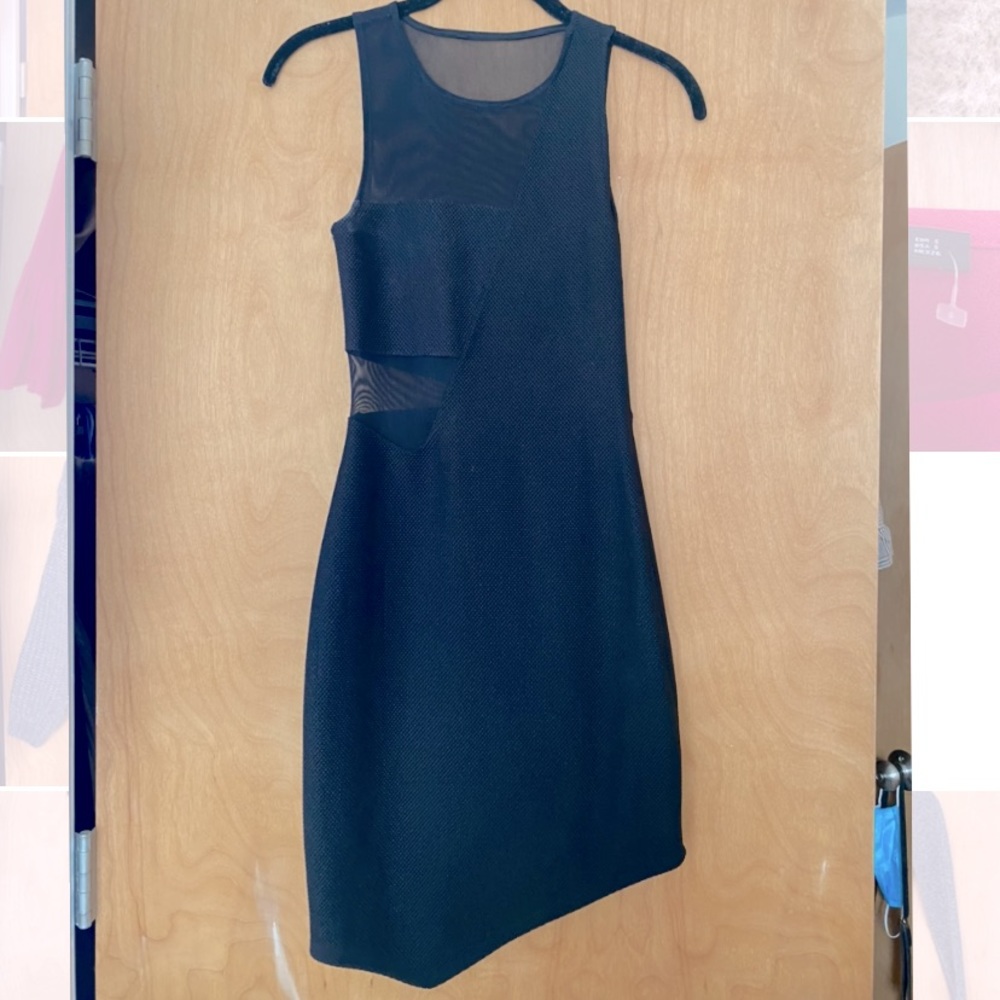 Black sleeveless dress with mesh cutouts
